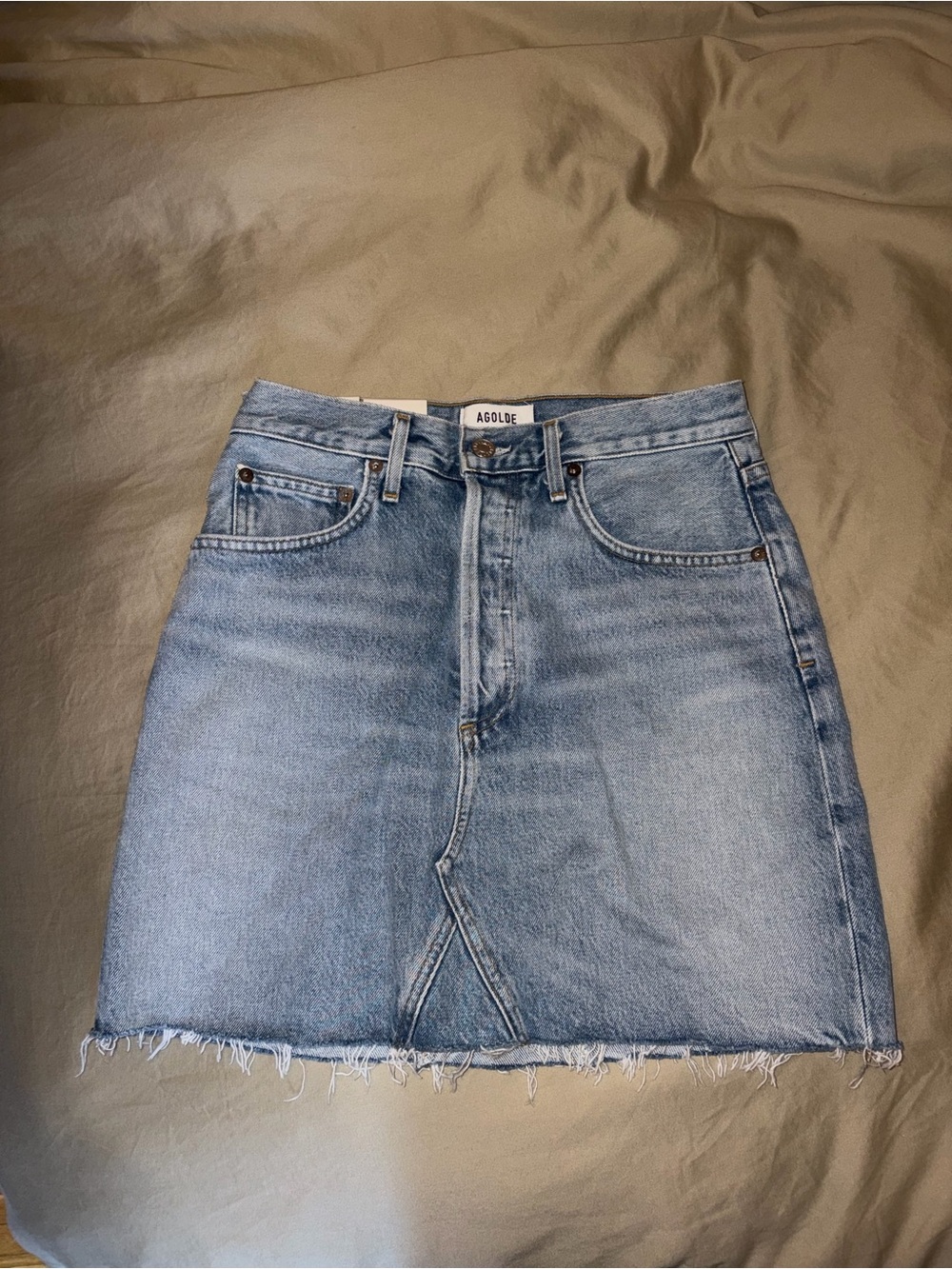 Agolde Light Wash Denim Mini Skirt with Raw Hem